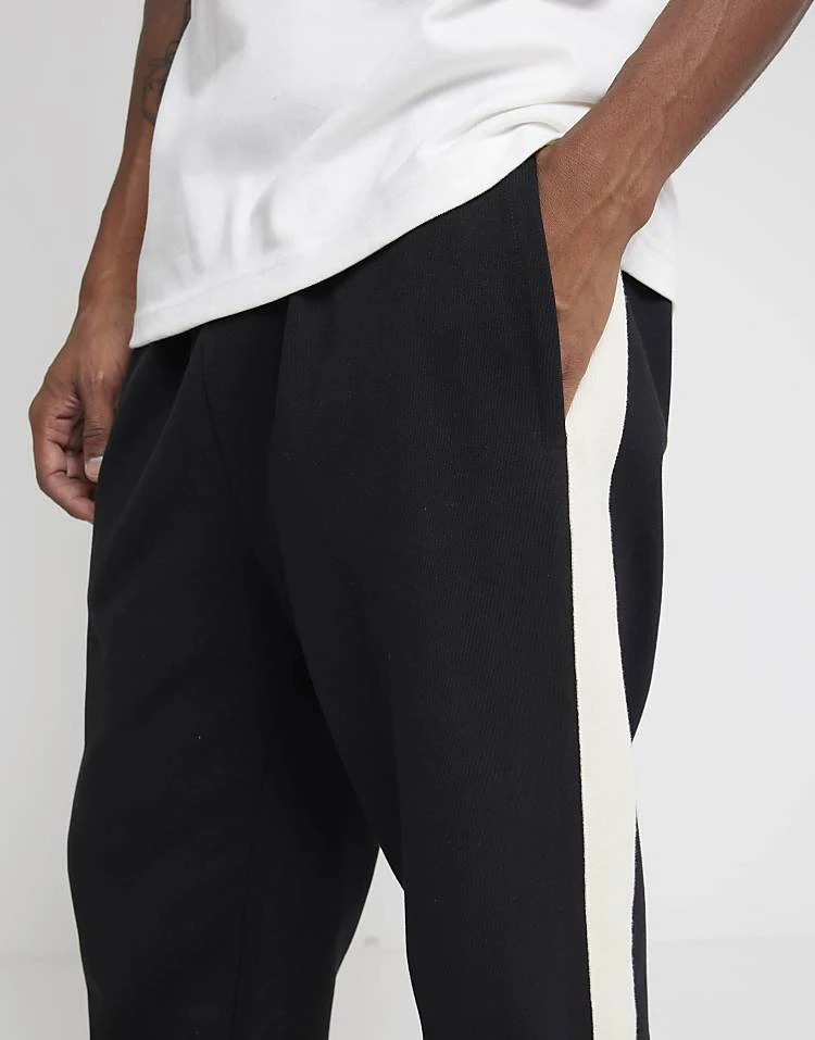 River Island Regular Fit Taped Joggers In Black For Men 4 River Island Regular Fit Taped Joggers In Black For Men - Image 2